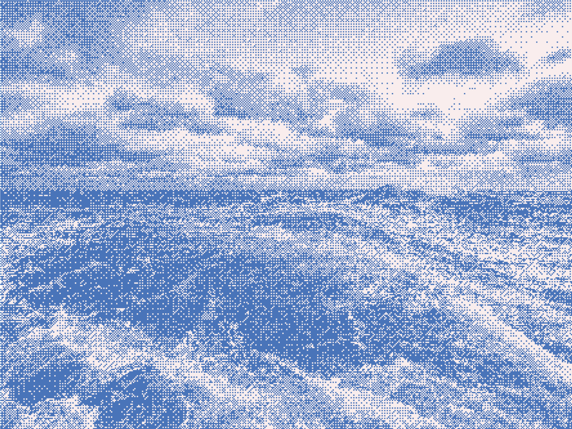 A pixelated photo of the sky and ocean